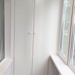 Шкафы с дверцами из сендвич панелей на балконы и лоджии в Уфе